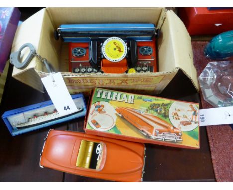 A 1950's clockwork tinplate JNF (West Germany) toy car, boxed with key (missing steering cable), together with a vintage boxe