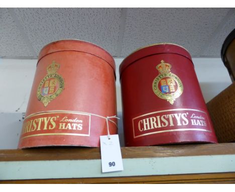 Two vintage 'Christys' London red pillar hat boxes.