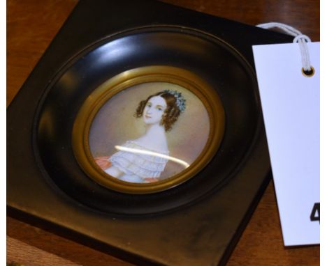 A 19th century style signed portrait miniature of a young lady on ivory in ebony frame.,