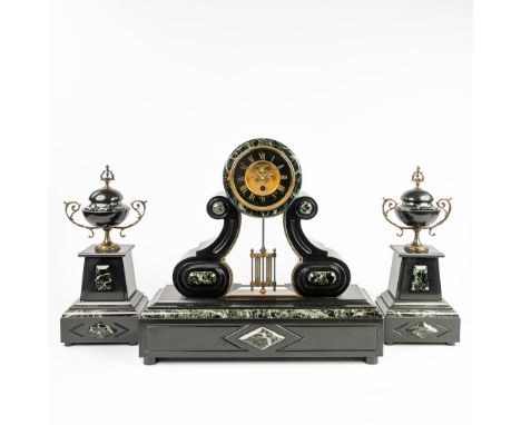 A three-piece mantle garniture clock made of black marble. Condition: The glass (front and back) and suspension spring are br