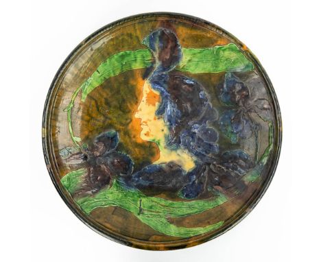 Arthur CRACO (1869-1955) An exceptionally large plate made of flemish earthenware, decorated with a female figurine. Art nouv
