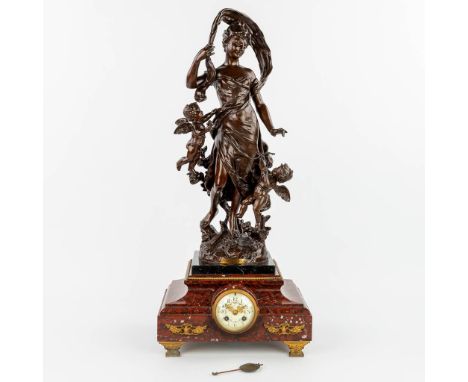 Henry KOSSOWSKI (1855-1921) 'Badinage' A 'mantle clock' made of red marble with a statue made of spelter and decorated with p