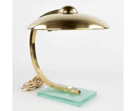 A table lamp made of metal and mounted on a glass base, in the style of Egon Hillebrand. The 1950s. (29 x 33 x 33 cm)