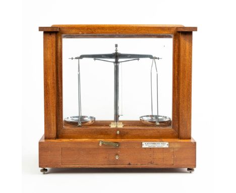 A pharmacy precision scale in a box made of wood and glass and marked A & R Francois Frres, Chatelet Belgique. (45 x 22 x 42 