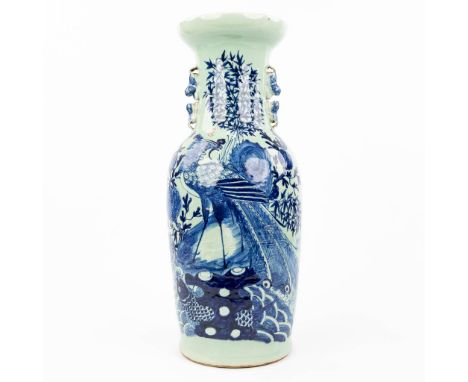 A Chinese vase with a blue-white decor of fauna and flora. 19th/20th century. Condition: Several hairlines trough the vase. (