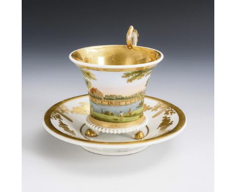 Ansichtentasse "Anton's". Ungemarkt, 1. H. 19. Jh.             Polychrom bemalt, goldstaffiert. Tasse (H 10,5 cm), Untertasse