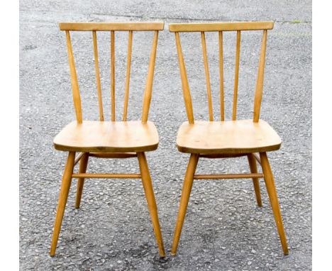 A pair of Ercol light elm and ash stick back kitchen chairs, 391, three spindles and shaped top rail (2)