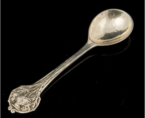 Omar Ramsden, an Arts and Crafts siler spoon, hand hammered, the terminal cast with stylised foliate decoration, London 1936,