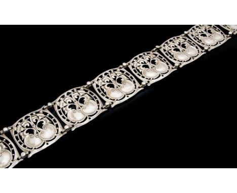 Jessie M King (attributed) for Liberty and Co., an Arts and Crafts silver belt, each of the twelve square section panels, cas