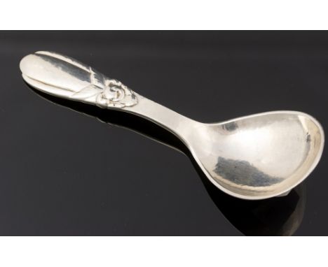 Evald Nielsen, a Danish silver cady spoon, 1927, hand hammered with stylised floral motif, 10.5cm long, 0.60ozt