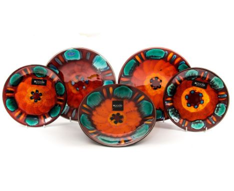 Five Poole Pottery dishes and plates 'Volcano' pattern, but different colourways 