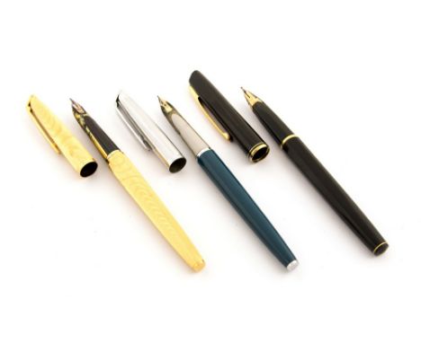 Waterman CF fountain pen, gold plated engine turned optic wave design, 18 carat gold nib, together with a blue and chrome cap