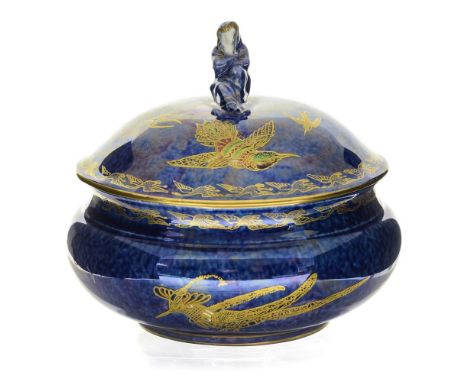 A Wedgwood lustre hummingbird covered bowl, sponged blue with gilt birds, the lid with mourning woman finial, the interior in