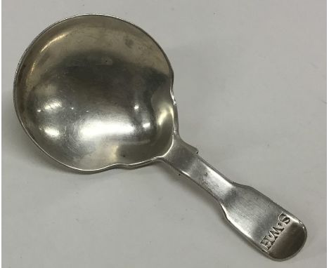 A heavy Georgian silver fiddle pattern caddy spoon. London. By SH&amp;DC. Approx. 18 grams. Est. £30 - £50.