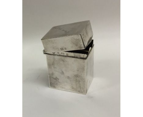A rectangular Edwardian silver card case with gilt interior. Birmingham. By SH&amp;DC. Approx. 91 grams. Est. £80 - £120.
