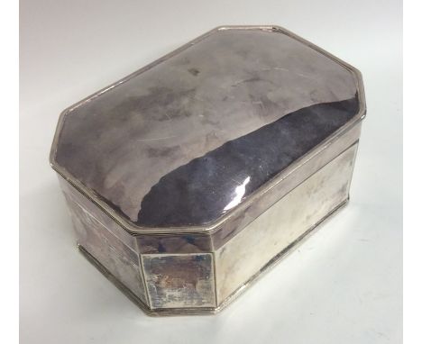 A heavy silver plated tea caddy together with manicure items etc. Est. £15 - £20.