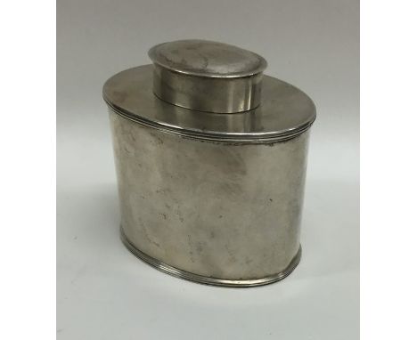 An oval silver tea caddy with lift-off cover. Approx. 160 grams. Est. £100 - £150.