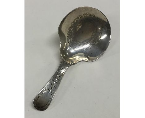 An attractive bright cut Georgian silver caddy spoon. London. By TW&amp;JH. Approx. 11 grams. Est. £40 - £60.