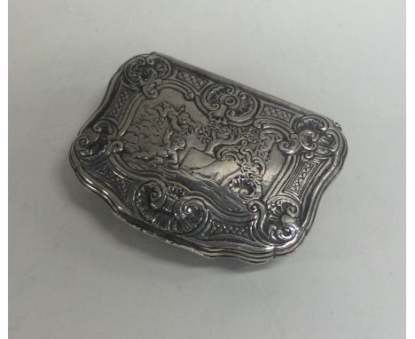 A good quality Georgian Norwegian silver snuff box attractively decorated with flowers, shells and winged infants with gilt i