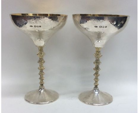 STUART DEVLIN: A good pair of silver and silver gilt champagne bowls. London. Approx. 437 grams. Est. £700 - £800.