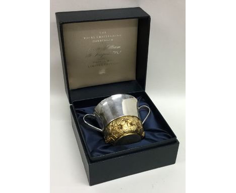 STUART DEVLIN: A good quality cased silver and silver gilt two handled porringer inscribed, "The Royal Christening". London. 