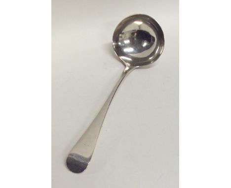 An Antique Georgian OE pattern silver sauce ladle. Struck 'GT'. Approx. 47 grams. Est. £20 - £30.