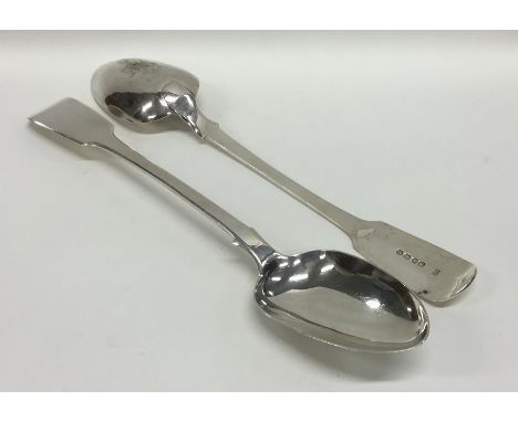 A pair of heavy Victorian silver basting spoons. London. By SH&amp;DC. Approx. 270 grams. Est. £130 - £150.