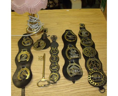 Small selection of horse brasses, brass table lamp etc.
