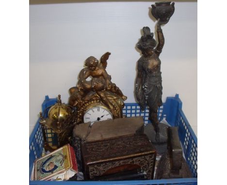 Box of assorted collectables including brass bracket clock, cast candle stick in the form of an Eastern European woman, flat 