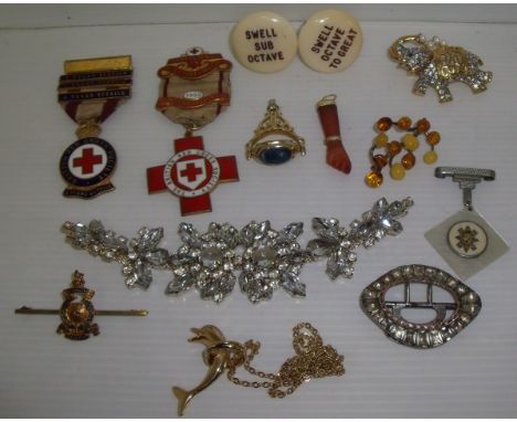 Selection of costume jewellery including cufflink's, Red Cross medals, enamel badges etc.