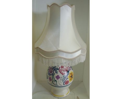 Large Poole Pottery lamp base with stylized flower pattern and shade