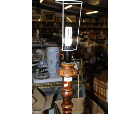 Turned and carved wood standard lamp