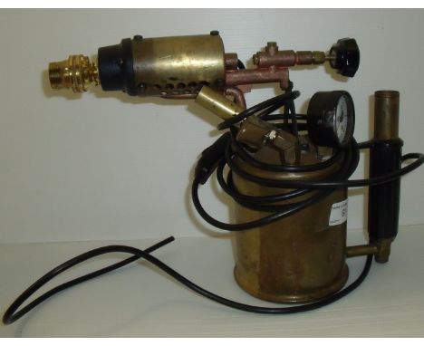 Brass blow torch converted to table lamp