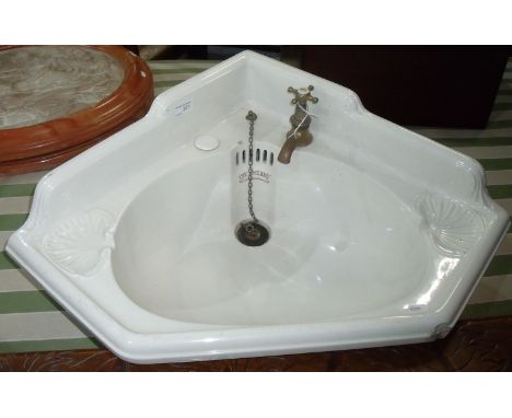 Late Victorian Oceanic corner fitting ceramic wash basin with brass tap