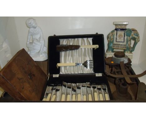 Set of scales, oak box containing small selection of fishing floats, cased set of cutlery, plaster figure of a young boy etc.