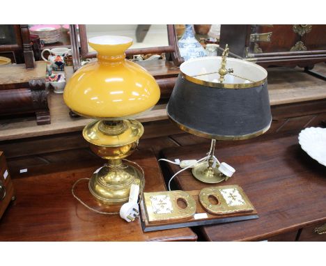 A VICTORIAN BRASS AND IVORINE MOUNTED WALNUT DESK TOP BOOK STAND with hinged extending ends, 34cm wide together with an old b