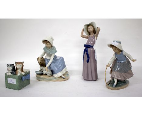 A LLADRO PORCELAIN FIGURINE OF A GIRL holding on a broad brimmed hat, 26cm high together with three Nao porcelain figurines c