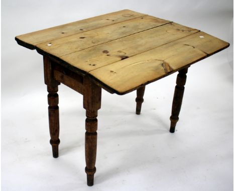 A PINE DROP LEAF DINING TABLE on turned tapering legs, 91cm wide together with a mahogany torchere and two tripod tables etc.