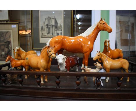 A BESWICK LARGE FIGURE OF A PALOMINO HORSE, 30cm high; five further foals, a Beswick fjord pony and other Beswick figures,a H