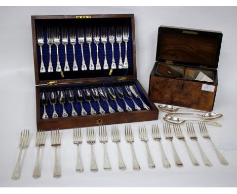 A VICTORIAN WALNUT TEA CADDY together with a cased set of 12 silver plated fish knives and forks and miscellaneous silver pla