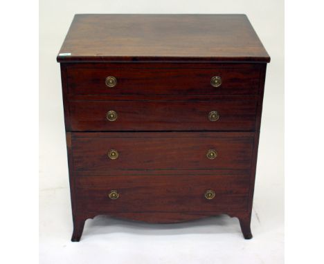 A 19TH CENTURY MAHOGANY COMMODE CHEST with a lifting top, ceramic bowl and four faux drawers with brass ring handles and stan