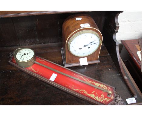 AN EDWARDIAN MAHOGANY CASED MANTLE CLOCK, the white dial with black Arabic numerals and the movement striking on a gong toget