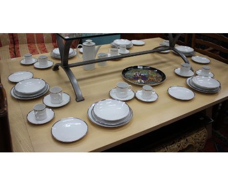 A THOMAS PART PORCELAIN TEA AND DINNER SERVICE with a silver lined rim