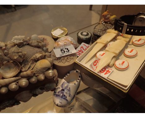 Pod wristwatch on a rubber strap six vintage ceramic buttons bone screw in toothpick two bone crocodiles collection of lidded