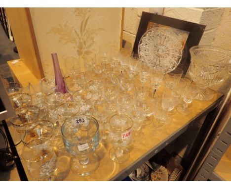 Shelf of glassware sets of wine glasses tumblers shot glasses seven decanter tops etc 