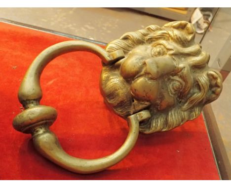 Large brass lion head brass door knocker 