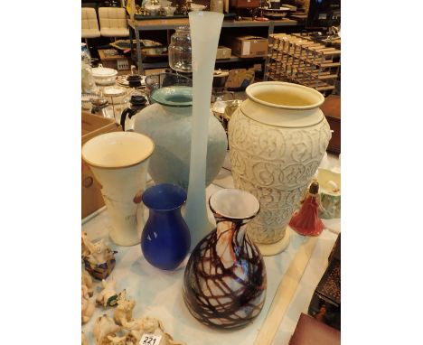 Mixed glass and ceramic vases