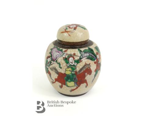 Japanese crackle glaze ginger jar and cover, approx 17 cms h, painted in enamel with warriors on horseback.&nbsp;