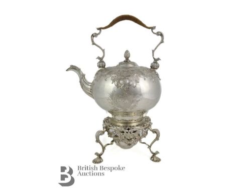 A very fine George II spirit kettle and stand, mm John Robinson II (1741-1765) London hallmark.  The teapot footed circular f