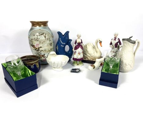 A group of assorted ceramics and decorative items, including a ‘Plymouth Gin’ water jug in the form of a fish; a resin model 